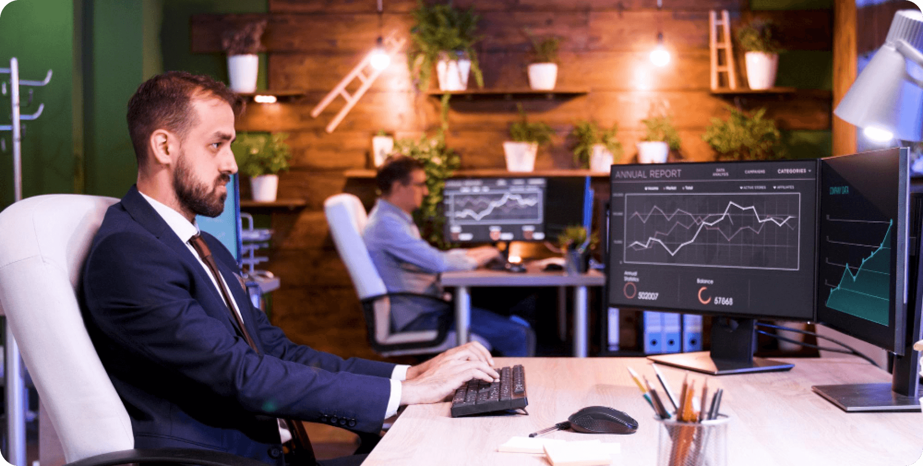 Professional investor analyzing market data on monitors